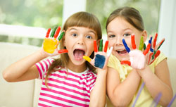 Image of children with painted hands